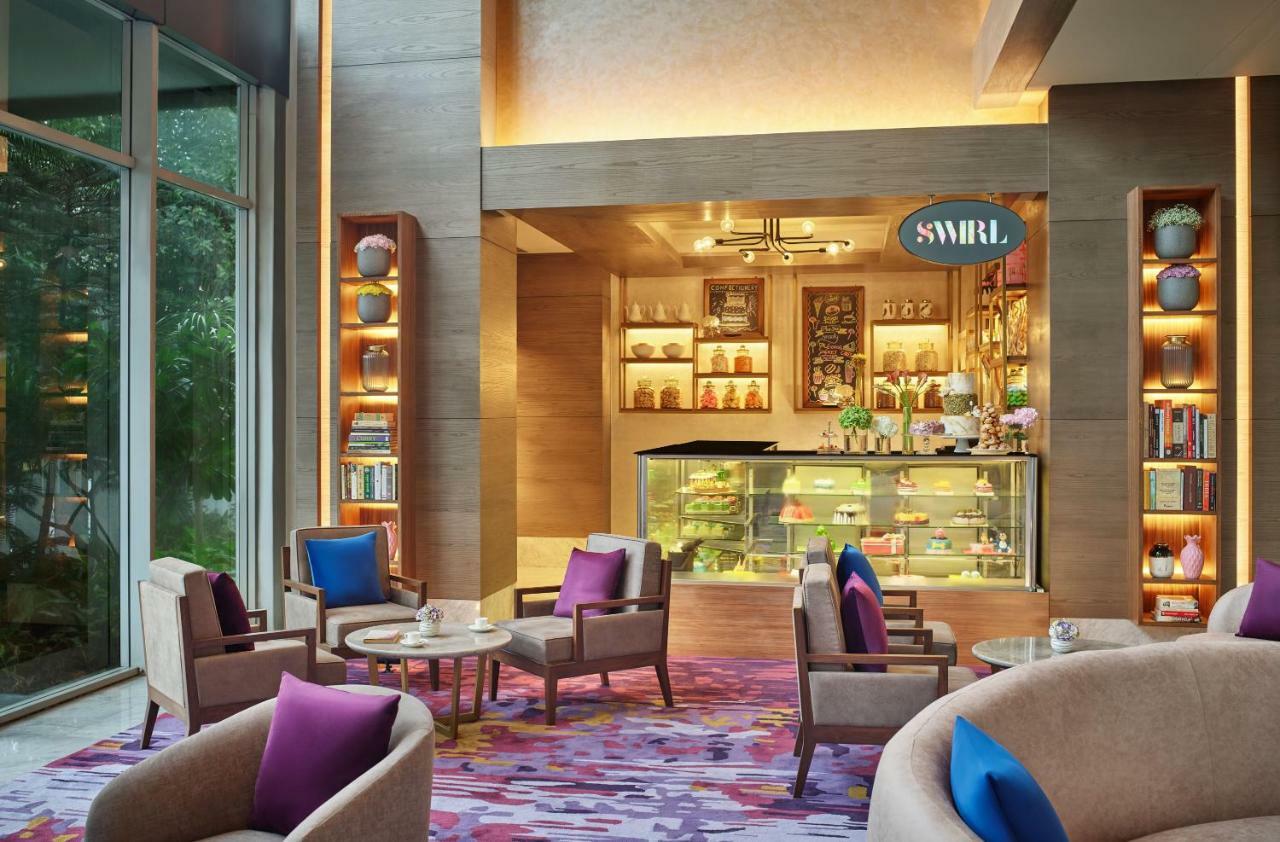 Vivanta Kolkata Em Bypass Exterior photo The Swirl Lounge at the airport